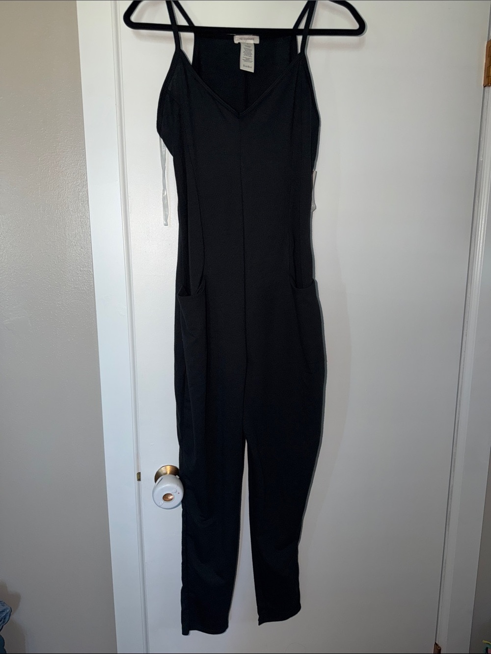 Black Sleeveless V-Neck Jumpsuit with Slim Taper and Pockets